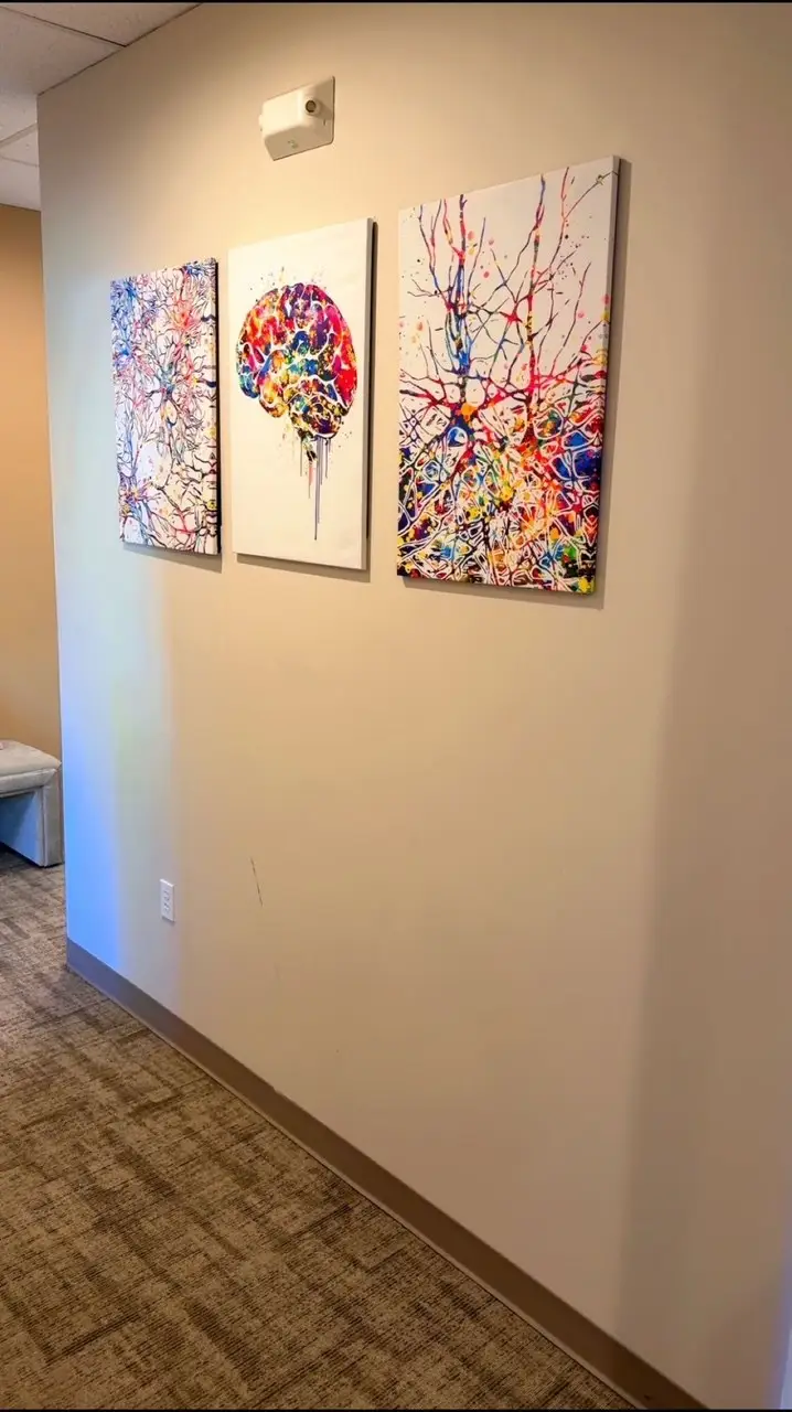 A hallway with mental health artwork